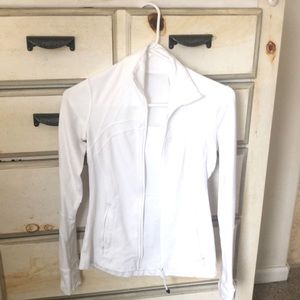 Size 2 Lululemon white zip up . Woren a few times , tags cut out.